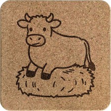 'Cow Sitting on Hay Bale'